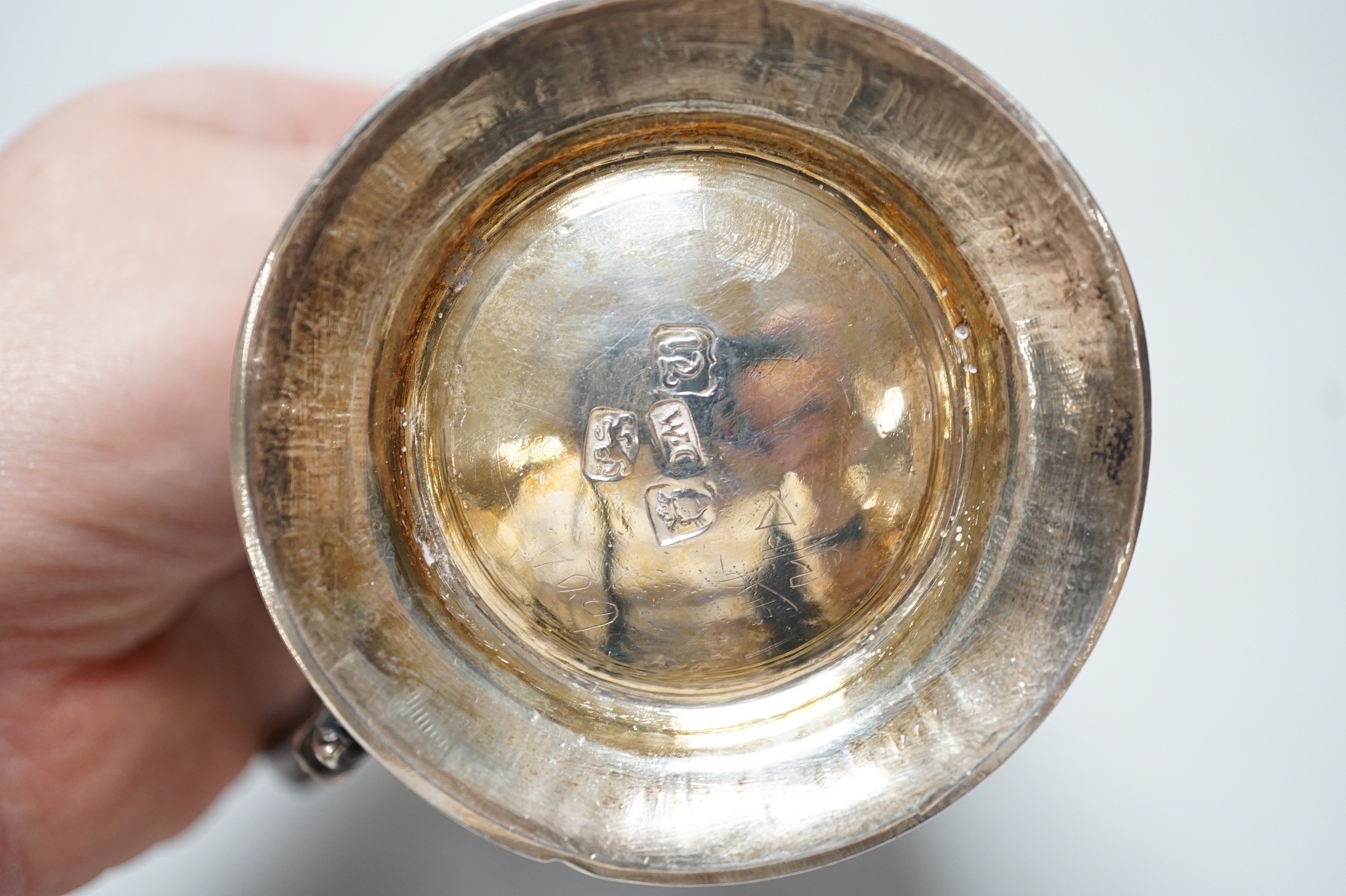 A George III silver small mug, with later embossed decoration, William Cripps, London, 1775, 95mm, 6.1oz.